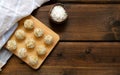 Healthy homemade sweet energy balls of dried fruits and nuts in coconut on a cutting board. As part of dried apricots raisins figs Royalty Free Stock Photo