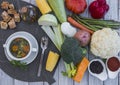 A healthy homemade vegetable soup fresh and ready to eat. Made with carrots, potatoes, peas, celery and broccoli. Raw vegetables Royalty Free Stock Photo