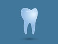 A healthy human blue tooth on blue background for dentists