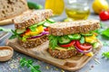Healthy hummus and vegetable sandwich on multi-grain bread, a delicious and nutritious lunch choice Royalty Free Stock Photo