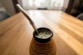 Yerba mate in ceramic matero, bombilla.