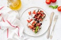 Healthy italian bruschetta with tomatoes, basil, feta cheese and balsamic sauce Royalty Free Stock Photo