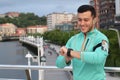 Healthy jogger using his fancy smartwatch