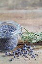 Healthy lavender tea in jar and dry lavender flowers.