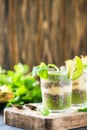 Healthy layered smoothie with kiwi, pineapple, chia. Copy space Royalty Free Stock Photo