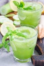 Healthy lemonade with cucumber, basil, lemon, honey and sparkling water, vertical Royalty Free Stock Photo