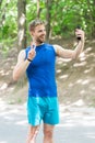 Healthy life. athletic man in sportswear make selfie. outdoor workout. Fitness app. Ui ux concept. gadget in modern Royalty Free Stock Photo