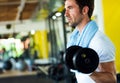 Healthy life and gym exercise concept. Fit man working out in sport fitness club Royalty Free Stock Photo