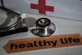 Healthy life message with stethoscope, health care concept. Royalty Free Stock Photo