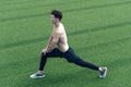 healthy life and self-control concept. Young citizen exercising outside and standing in yoga. Young athlete stretch in Royalty Free Stock Photo