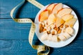 Healthy lifestyle. Apple and orange juice on a wooden background Royalty Free Stock Photo