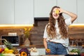 Healthy lifestyle concept, beautiful smiling woman Holding Fresh Lemon Slice In Front of her One Eye While Looking at Royalty Free Stock Photo