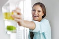 Healthy Lifestyle Concept, Diet And Fitness. Woman Drinking Water With Lemon , Lime And Mint