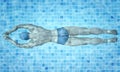 Healthy lifestyle. Fit swimmer training in the swimming pool. Professional male swimmer inside swimming pool. Texture of