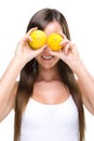 Healthy lifestyle - Fitt woman , before the eyes of two lemons Royalty Free Stock Photo