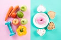 Healthy lifestyle, food and sport concept. Top view of healthy versus unhealthy. Donut and various types of sugar VS fruit Royalty Free Stock Photo