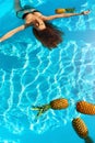 Healthy Lifestyle, Food. Young Woman In Pool. Fruits, Vitamins. Royalty Free Stock Photo