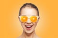 Happy teenage girl in sunglasses with oranges Royalty Free Stock Photo