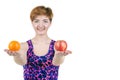 Healthy lifestyle, healthy eating. Young girl with a bottle of apple and orange, smiling, on a white isolated background. Horizont Royalty Free Stock Photo