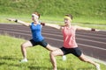 Healthy Lifestyle Ideas and ConceTwo Young Caucasian Girlfriends in Athletic Sportswear Having Armspts. Two Young Caucasian Royalty Free Stock Photo