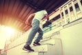 Healthy lifestyle middle aged man runner running upstairs with sunset, sunrise Royalty Free Stock Photo