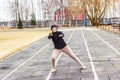 Older woman doing outdoor exercise.