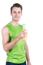 Healthy lifestyle. Portrait of a handsome guy with juice, wearing sportswear, isolated on white background, looking at camera. Ver Royalty Free Stock Photo