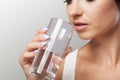 Healthy Lifestyle. Portrait Of Happy Smiling Young Woman With Glass Of Fresh Water. Healthcare. Drinks. Health, Beauty, Diet Royalty Free Stock Photo