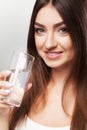 Healthy Lifestyle. Portrait Of Happy Smiling Young Woman With Glass Of Fresh Water. Healthcare. Drinks. Health, Beauty, Diet Royalty Free Stock Photo