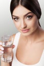 Healthy Lifestyle. Portrait Of Happy Smiling Young Woman With Glass Of Fresh Water. Healthcare. Drinks. Health, Beauty, Diet Royalty Free Stock Photo