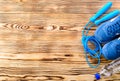 Healthy lifestyle and sport background. Sport shoes, skipping rope and bottle of water on the wooden background with copyspace, t Royalty Free Stock Photo