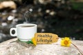 Healthy lifestyle text with coffee cup Royalty Free Stock Photo