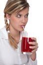 Healthy lifestyle - Woman drinking tomato juice Royalty Free Stock Photo