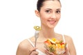 Healthy lifestyle, woman holding fruit salad Royalty Free Stock Photo