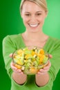 Healthy lifestyle - woman holding fruit salad bowl Royalty Free Stock Photo