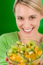 Healthy lifestyle - woman holding fruit salad bowl Royalty Free Stock Photo