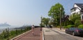 Healthy lifestyle. Woman is jogging on Hamilton ave by Hamilton park, New Jersey. Manhattan of New York City in the Royalty Free Stock Photo