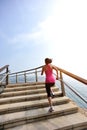 Healthy lifestyle woman legs running on stone stai Royalty Free Stock Photo