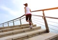 Healthy lifestyle woman legs running on stone stai Royalty Free Stock Photo