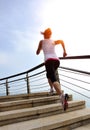 Healthy lifestyle woman legs running on stone stai Royalty Free Stock Photo