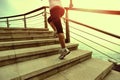 Healthy lifestyle woman legs running on stone stai Royalty Free Stock Photo