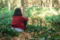 Healthy lifestyle for women practicing meditation and yoga in the forest. Young woman practicing yoga outdoors. Meditation concept Royalty Free Stock Photo