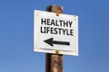 Healthy lifestyle word and arrow signpost Royalty Free Stock Photo