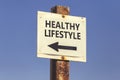 Healthy lifestyle word and arrow signpost 2 Royalty Free Stock Photo