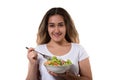 Healthy lifestyle young girl eating a fresh salad smiling happy Royalty Free Stock Photo