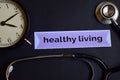 Health Strategy on the print paper with Healthcare Concept Inspiration. alarm clock, Black stethoscope.Healthy Living on the print