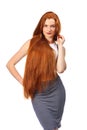 Healthy Long Red Hair. Beautiful Young Woman isolated on a white Royalty Free Stock Photo