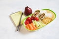 Healthy lunch box with sandwich and fresh vegetables, fruits, bottle of water and juice. from top view Royalty Free Stock Photo