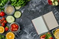 Healthy lunch boxes and blank notepad for diet plan with text space flat lay photography