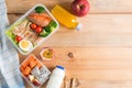 Healthy lunch boxes in plastic package, Grilled chicken breast with sweet potato, egg and vegetable salad, fruit, orange juice, Royalty Free Stock Photo